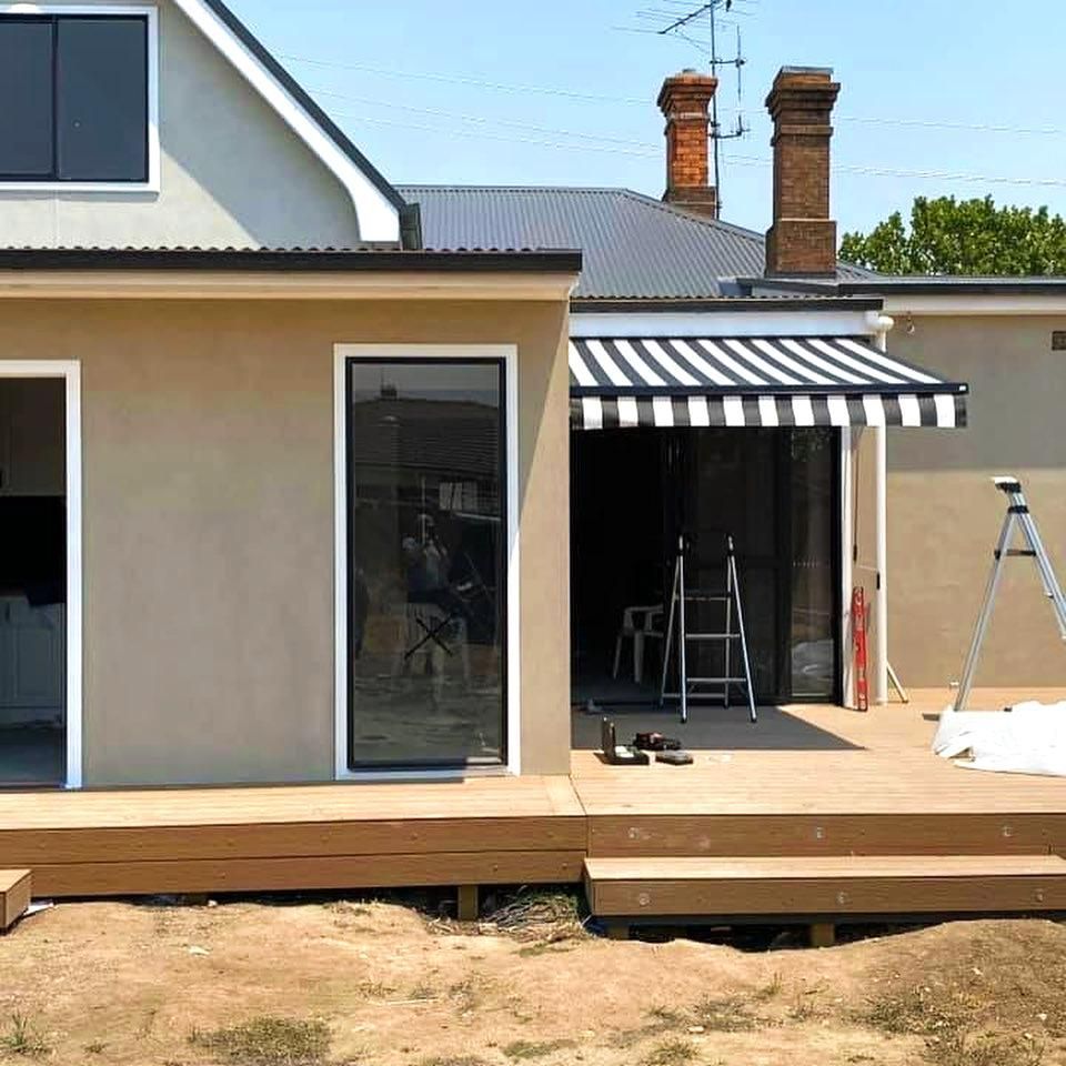 Renovated House With Wooden Deck And Awning — JSF Interiors Goulburn in Shellharbour, NSW