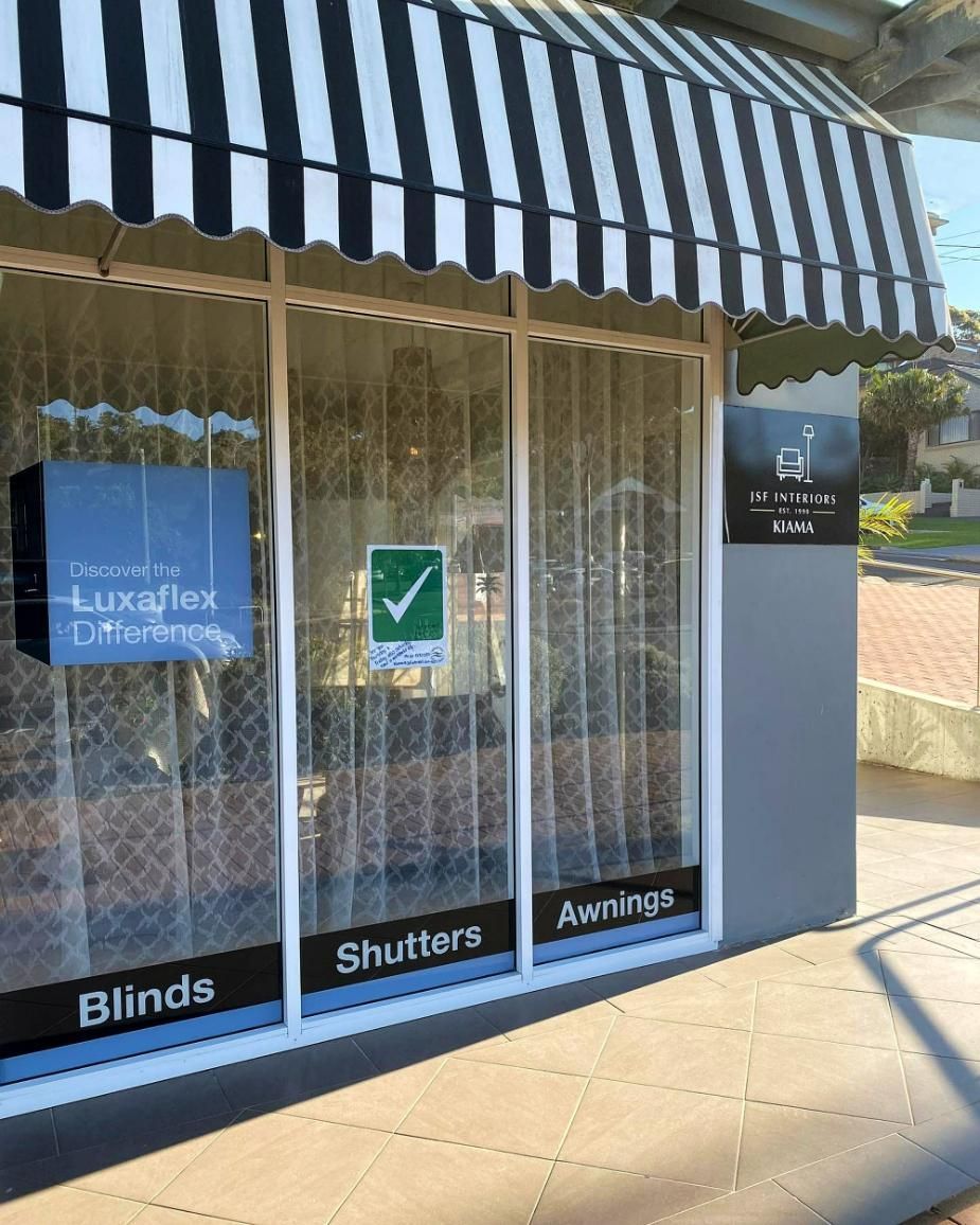 Storefront With Awning And Blinds Shutters Awnings Signs — JSF Interiors Goulburn in Dapto, NSW