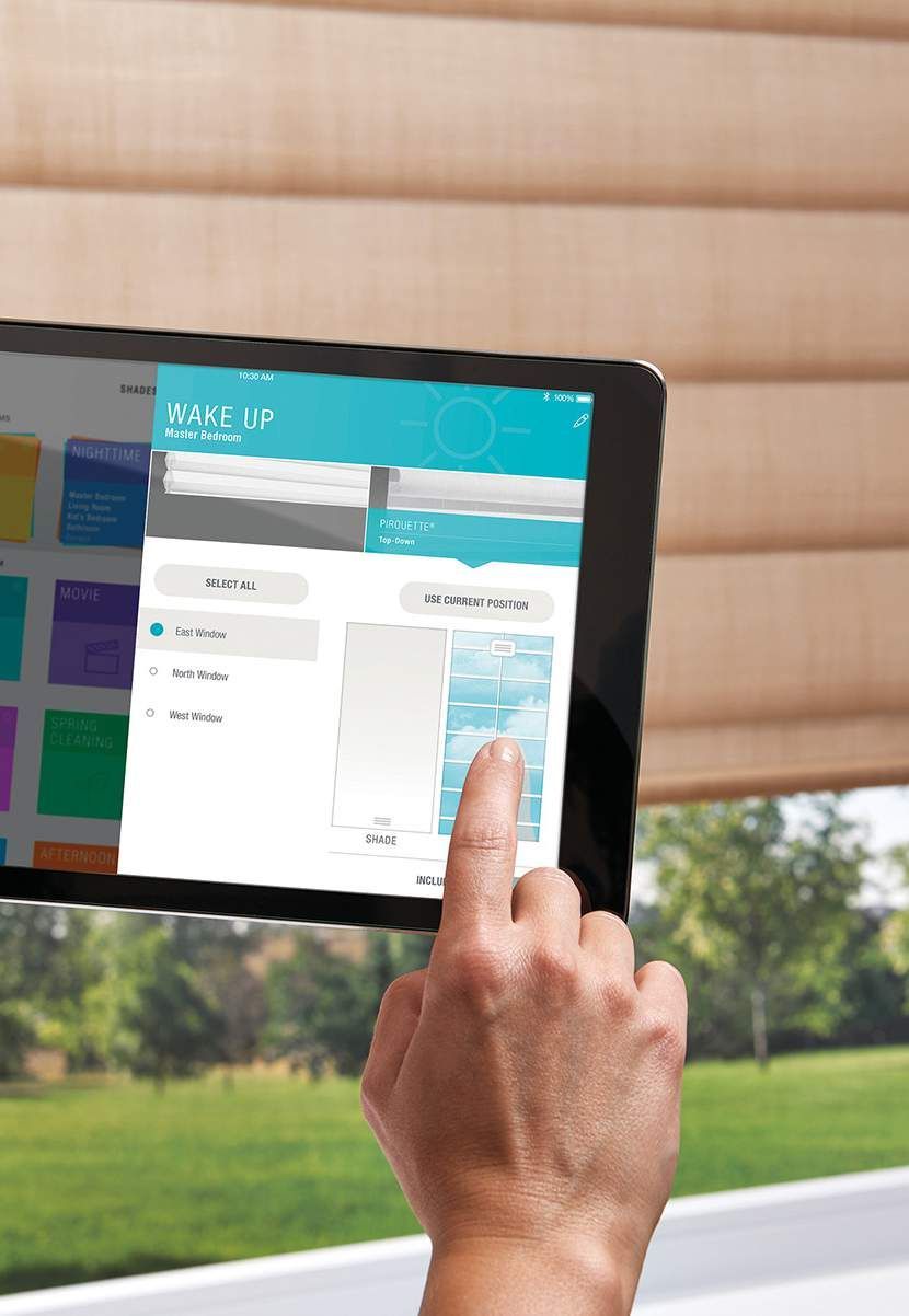 Person's Finger Touching Tablet Screen Showing Smart Blinds Control App — JSF Interiors Goulburn in Goulburn, NSW