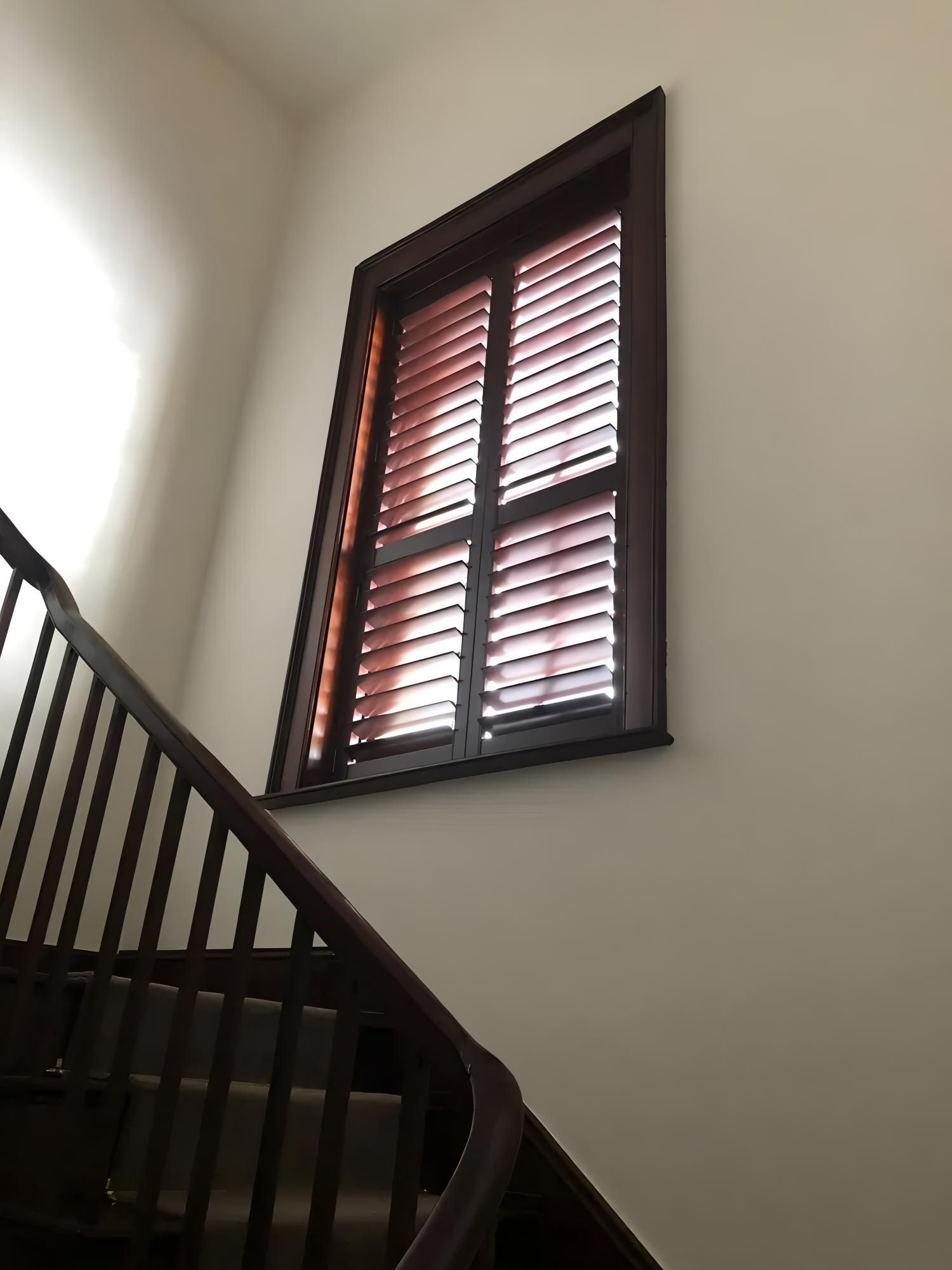 Wooden Staircase With Dark Railing And Brown Shutters — JSF Interiors Goulburn in Goulburn, NSW