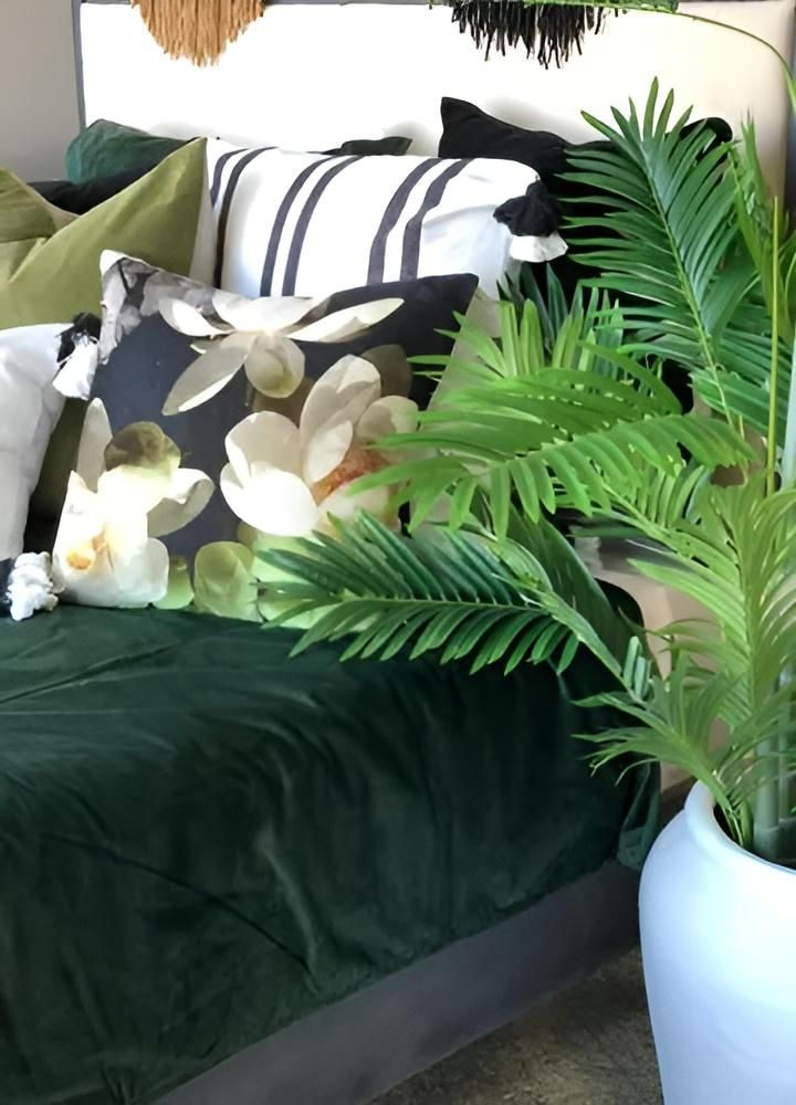 Bed With Green Velvet Cover, Floral Pillow, White Pot Plant — JSF Interiors Goulburn in Goulburn, NSW