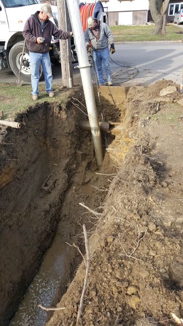 Drain Services — Two Man Repairing the Pipes in Mendota, IL