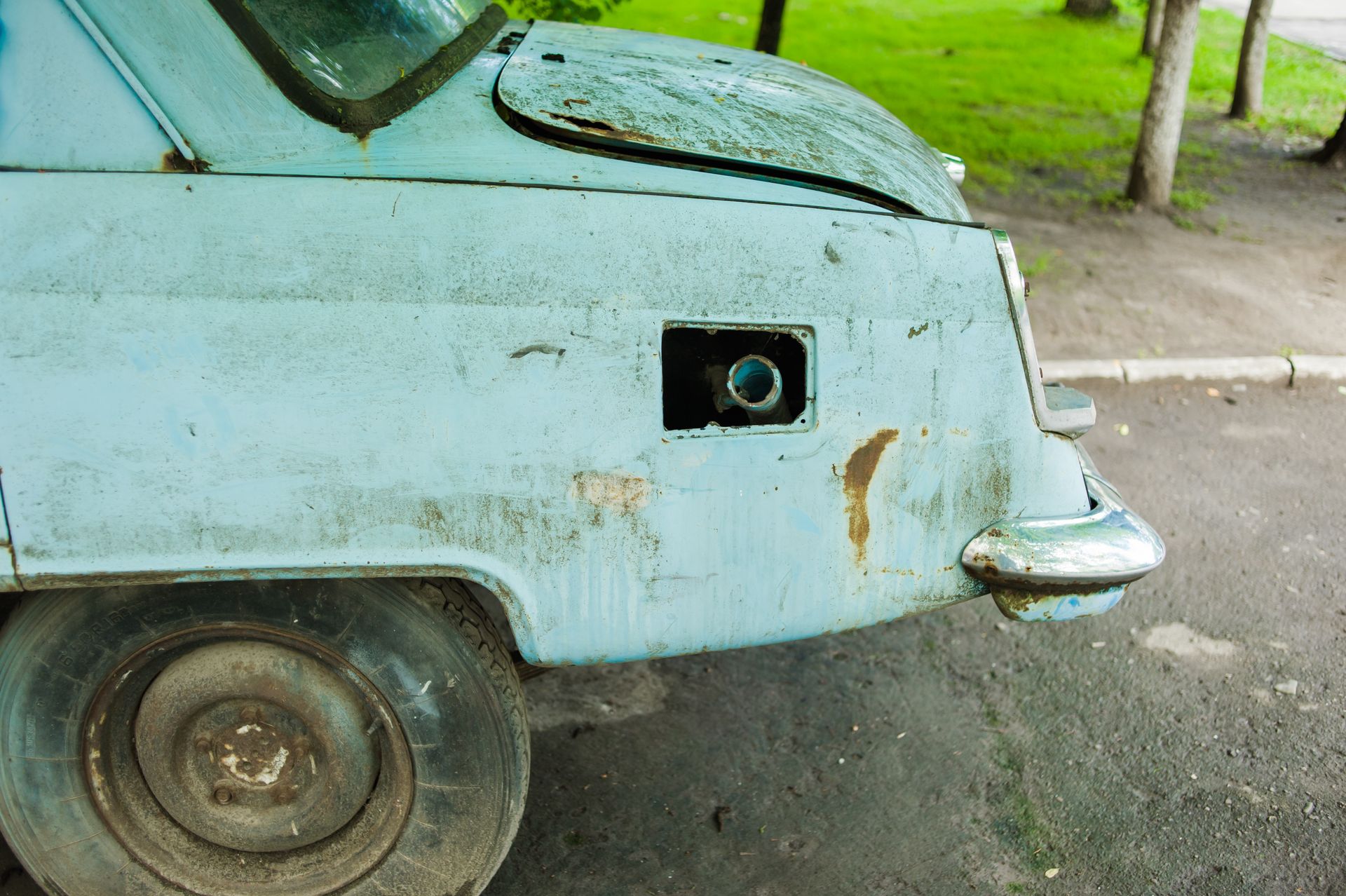Old, Weathered Blue Car's Rear — Mid Coast Smash Repairs In Tuncurry, NSW