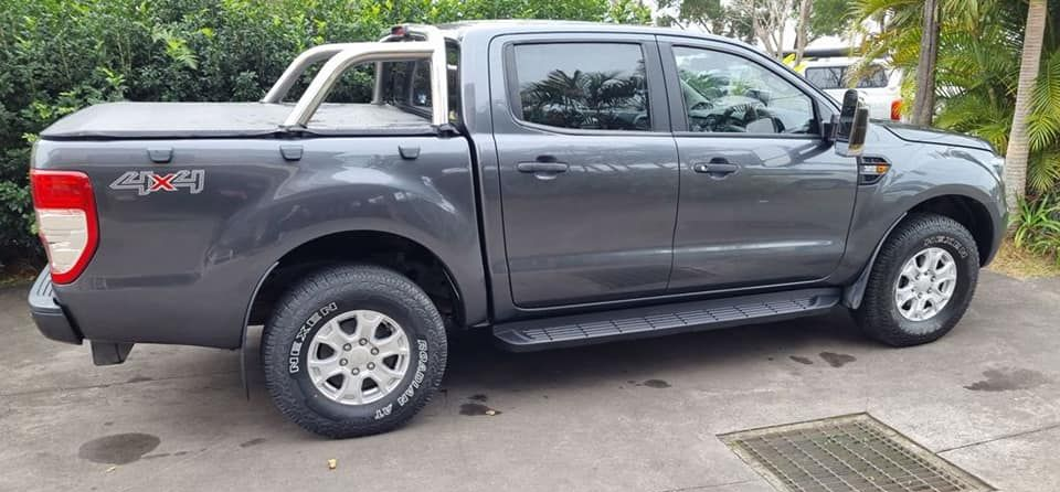Gray Ford Ranger pickup truck parked outdoors.  — Mid Coast Smash Repairs In Tuncurry, NSW