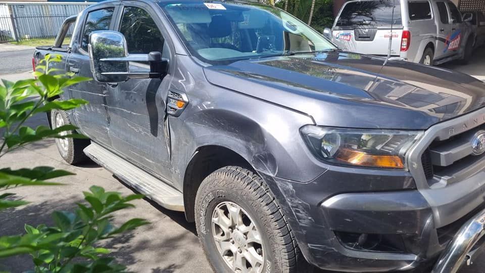 Dark Gray Ford Ranger Pickup Truck Parked Outdoors — Mid Coast Smash Repairs In Forster, NSW