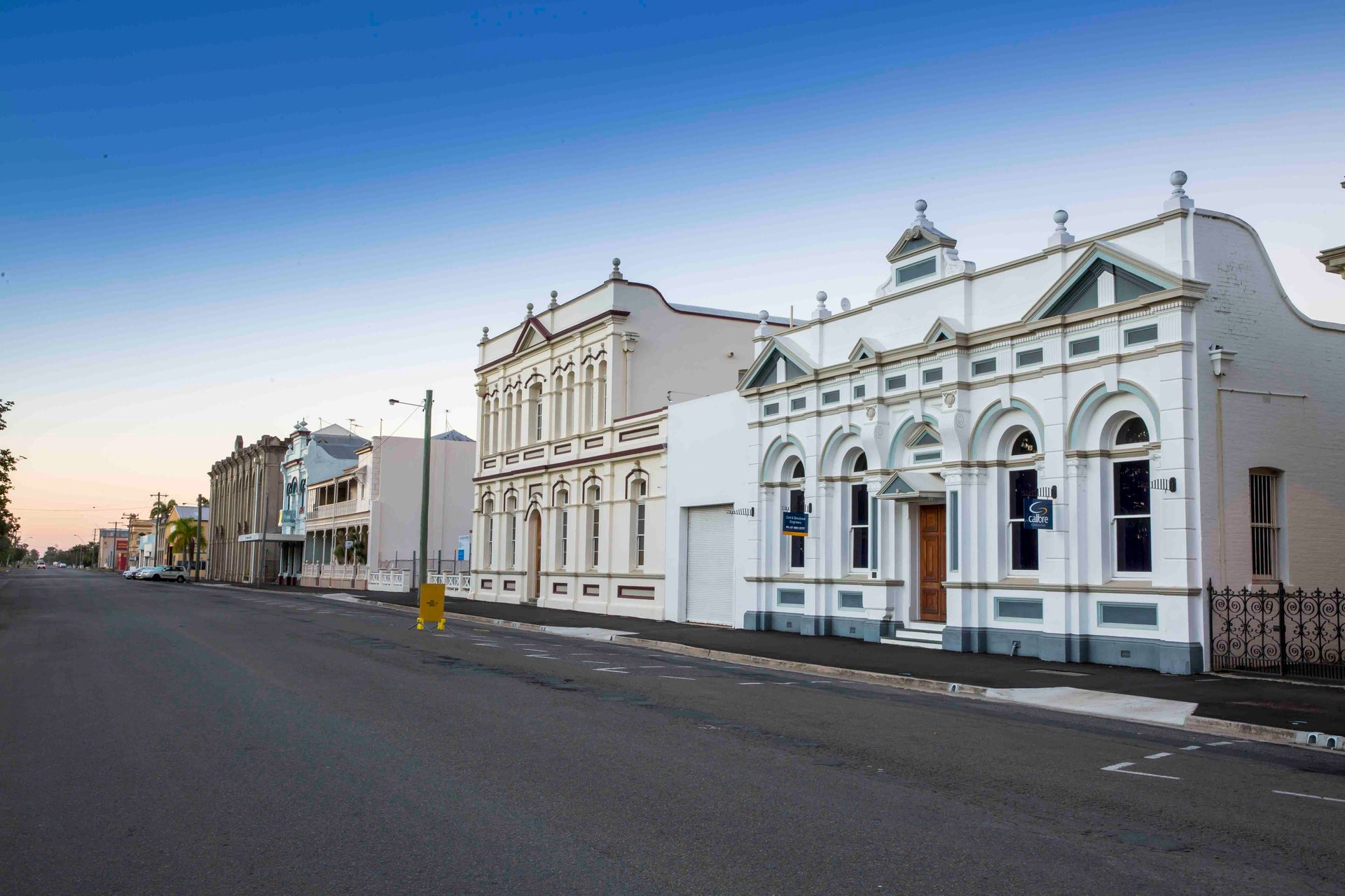 Classic White Buildings — Septic Cleaning in Rockhampton, QLD