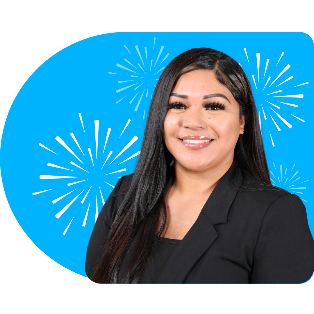 A person with a beard and glasses, wearing a suit and blue striped tie, centered against a blue background with white stars.