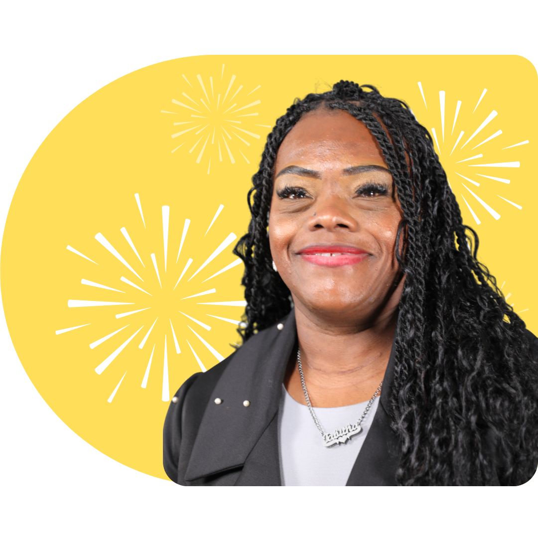 A person smiling, wearing a white blazer against a bright blue background featuring white, stylized firework illustrations.