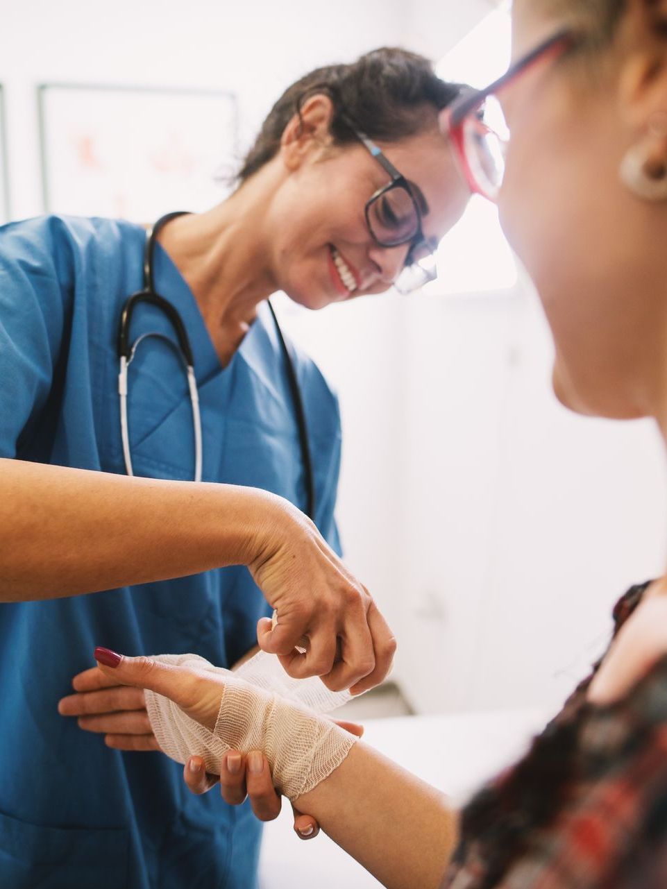 Houston TX diabetes doctor pricking patients finger