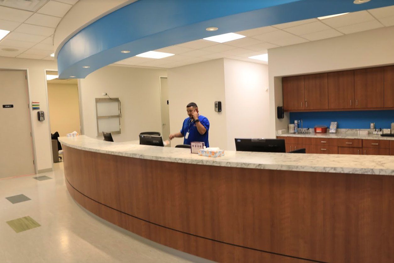 Doctor at front desk at St. Hope Foundation in Dickinson TX
