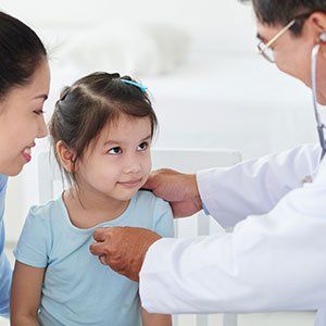 Houston TX Pediatrician with a child  patient