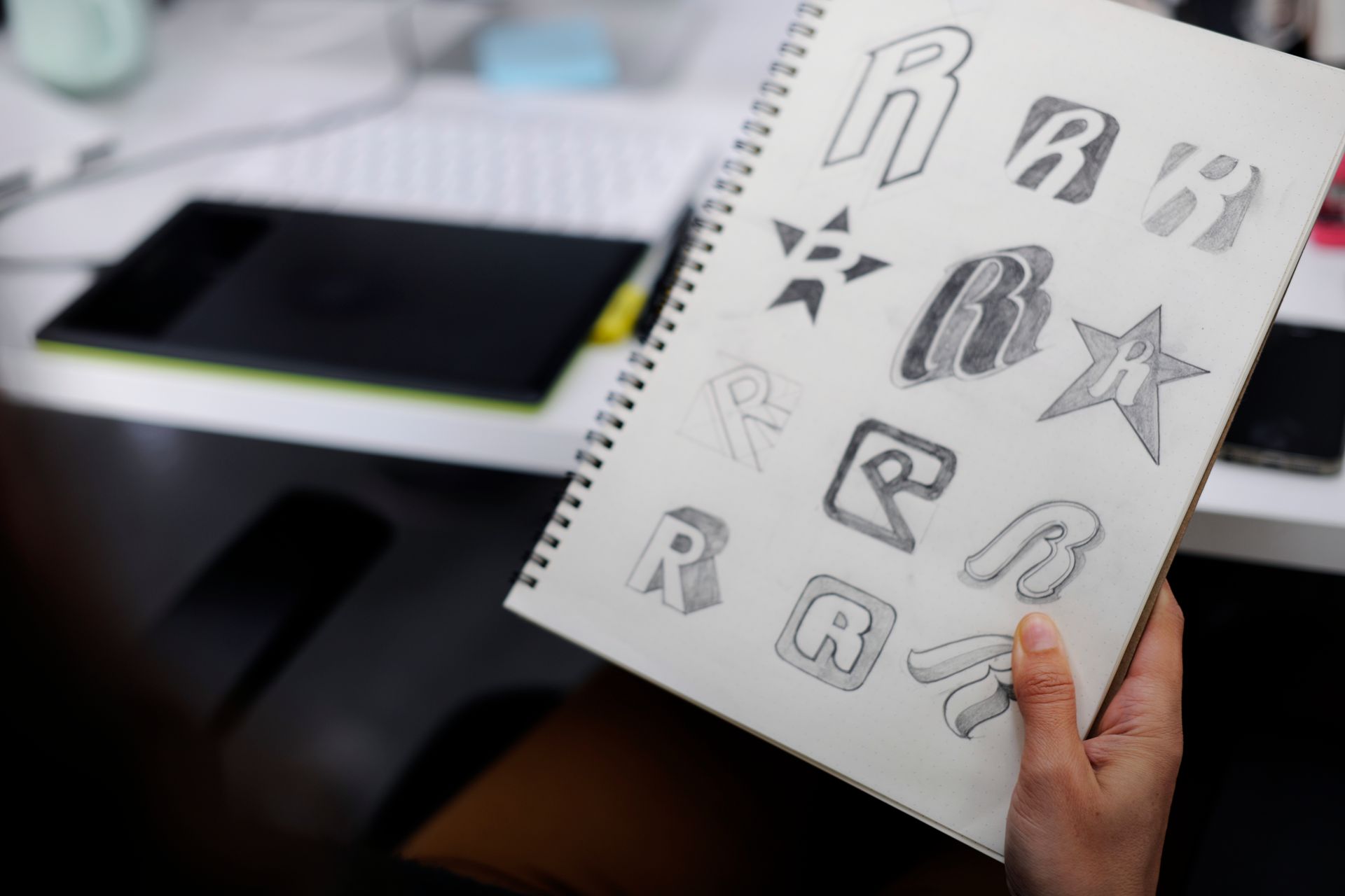 Picture of a woman making a custom logo