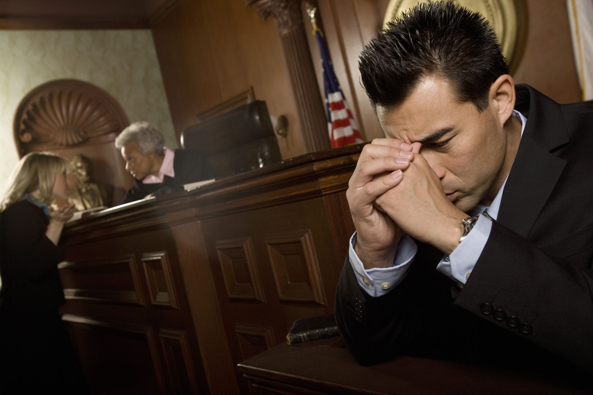 Man sitting in courtroom, representing assault attorney in Spokane, WA.