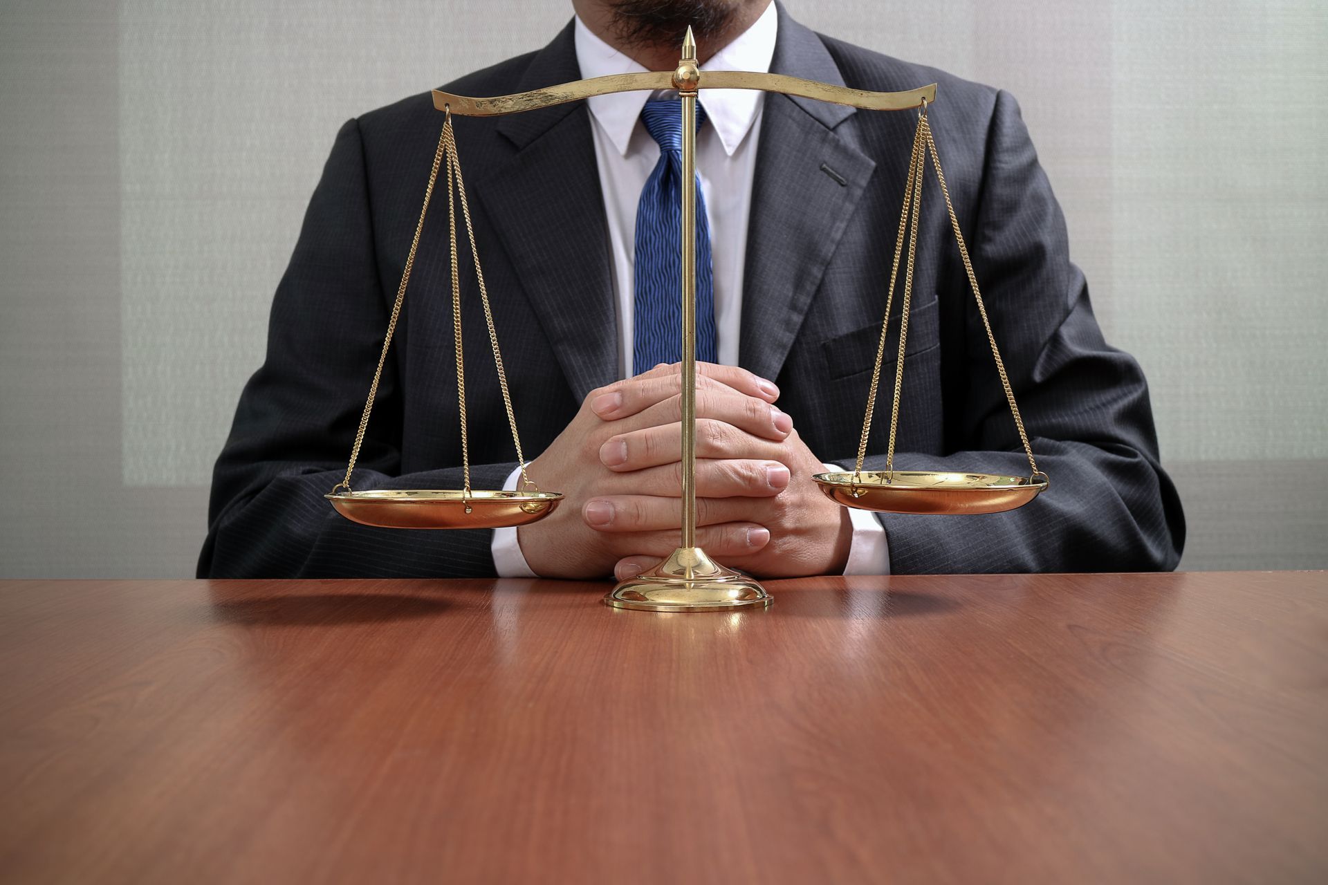 Felony attorney in Spokane, WA sitting behind justice scales.