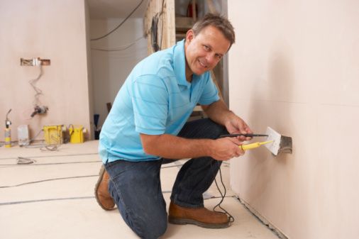 A man performing electrical services in La Crosse, WI