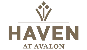 Logo for Haven at Avalon: brown text, top emblem, light brown.