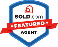 A blue realtor logo on a white background