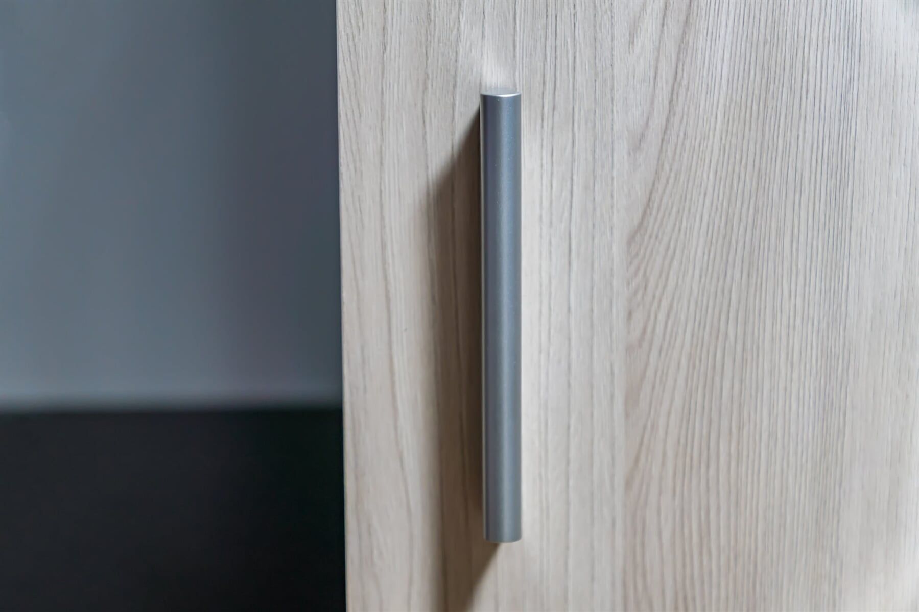 A Close up Of a Metal Handle on A Wooden Door — Lock & Door in Wodonga, VIC
