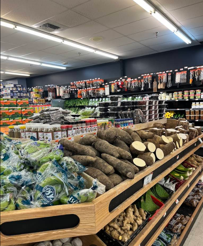 A grocery store filled with lots of fruits and vegetables.