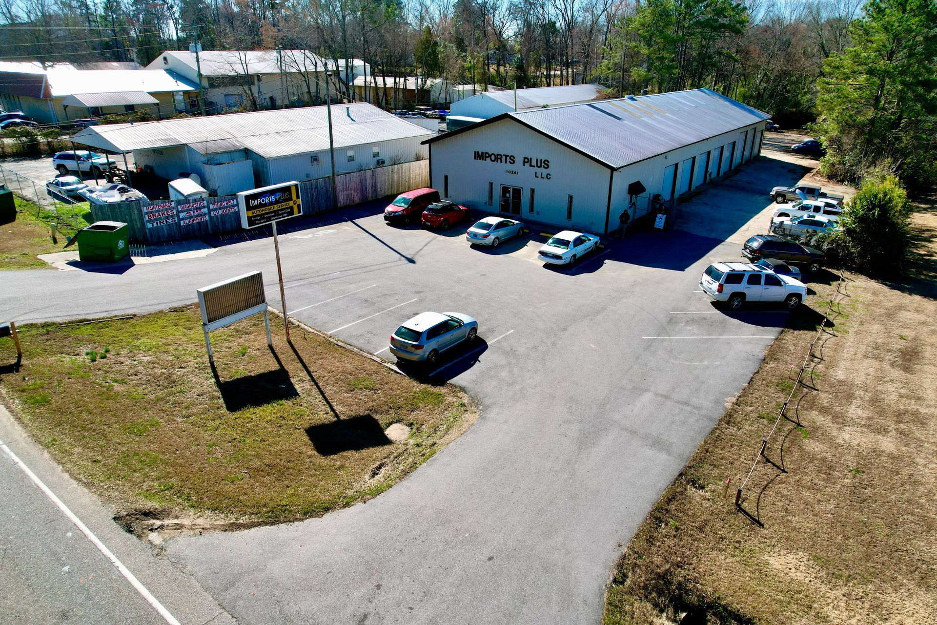 Aerial View Shows a Light-Colored Building | Imports Plus