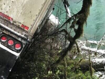 Truck Hanging on a Branch of Tree — Albany, OR — AA Towing