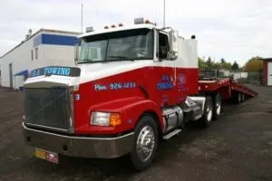 Towing White and Red Truck — Albany, OR — AA Towing