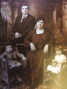 A close up of a bunch of flowers with a dark background.