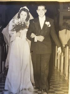 A close up of a bunch of flowers with a dark background.