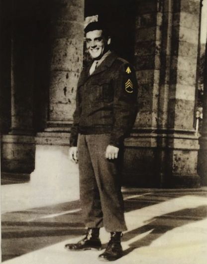 A close up of a bunch of flowers with a dark background.