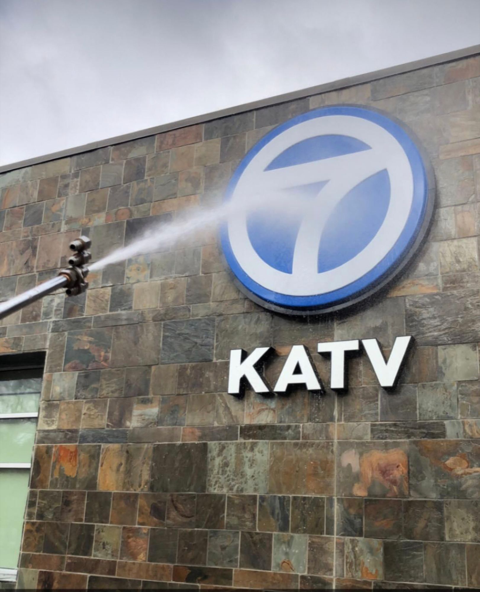 Katv is sprayed on the side of a building