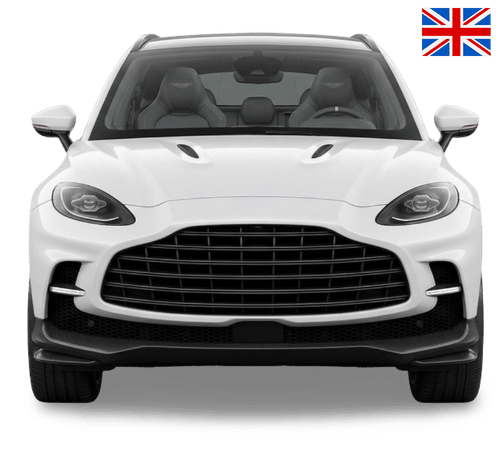Front view of a white Aston Martin DBX SUV with a black front grille and a small British flag in the corner.as