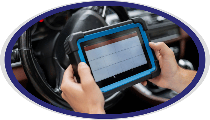 Vehicle diagnostic scanner tool inside car