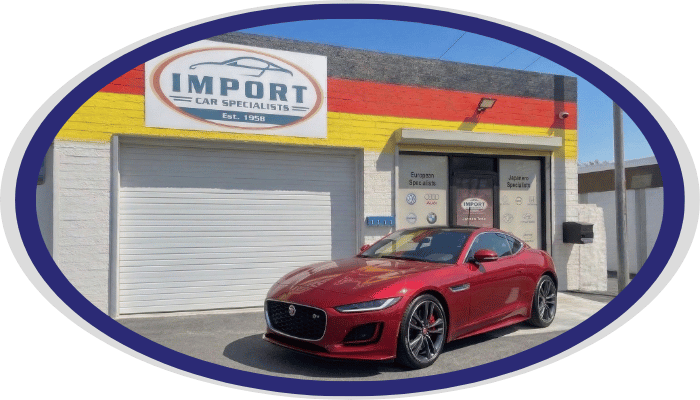 Jaguar sports sedan outside Import Car Specialists shop