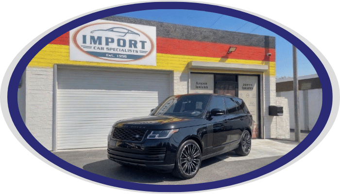 Land Rover SUV parked outside Import Car Specialists shop