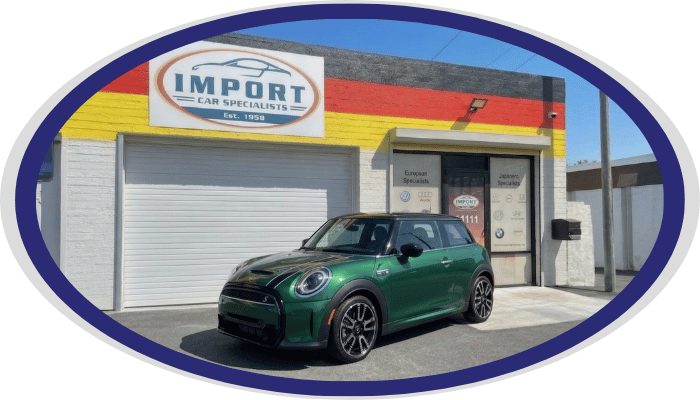 MINI Cooper hatchback parked outside Import Car Specialists shop