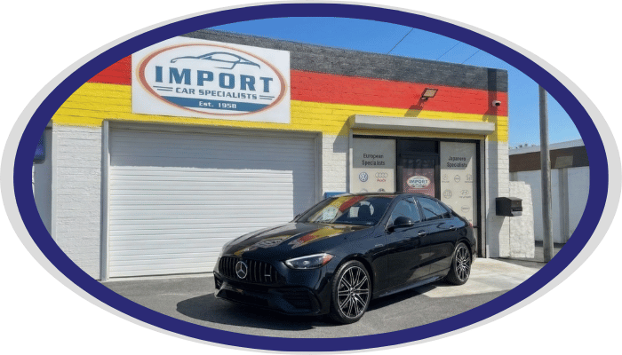 Mercedes-Benz performance sedan parked outside Import Car Specialists shop