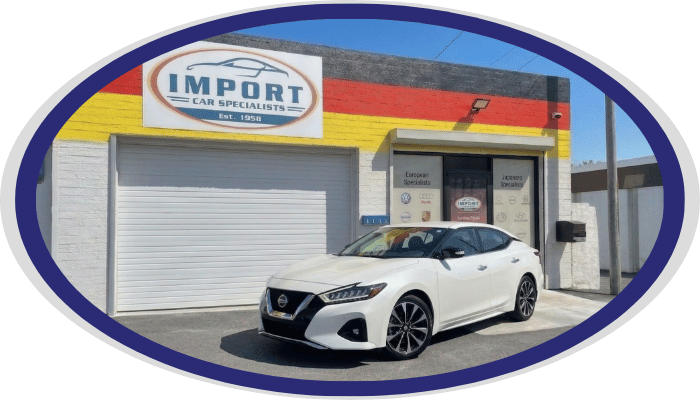 Nissan sedan parked outside Import Car Specialists shop