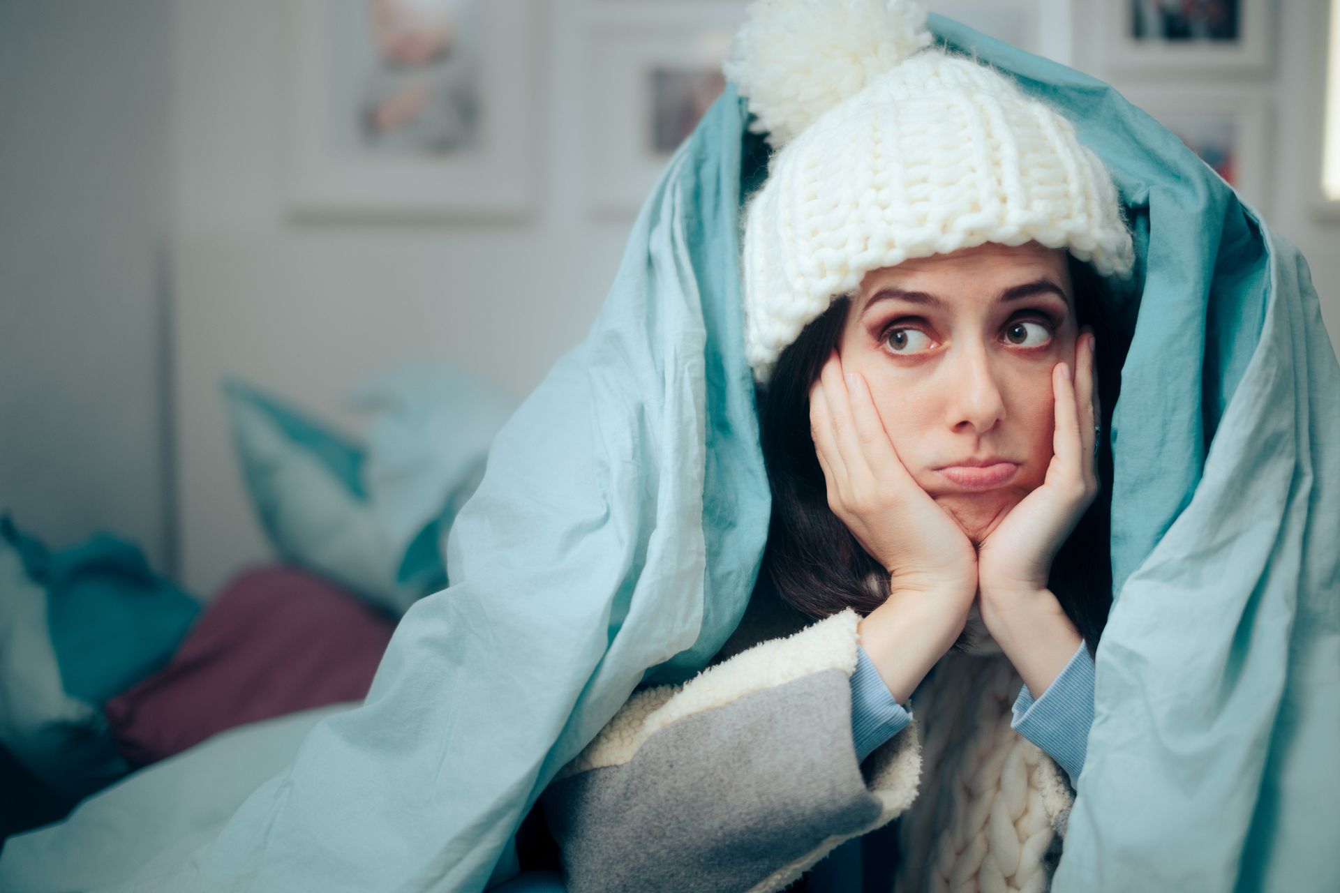 Unhappy Woman Feeling Cold Wearing Warm Winter Clothes Indoors.