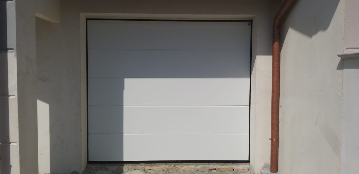 portone sezionale per casa privata