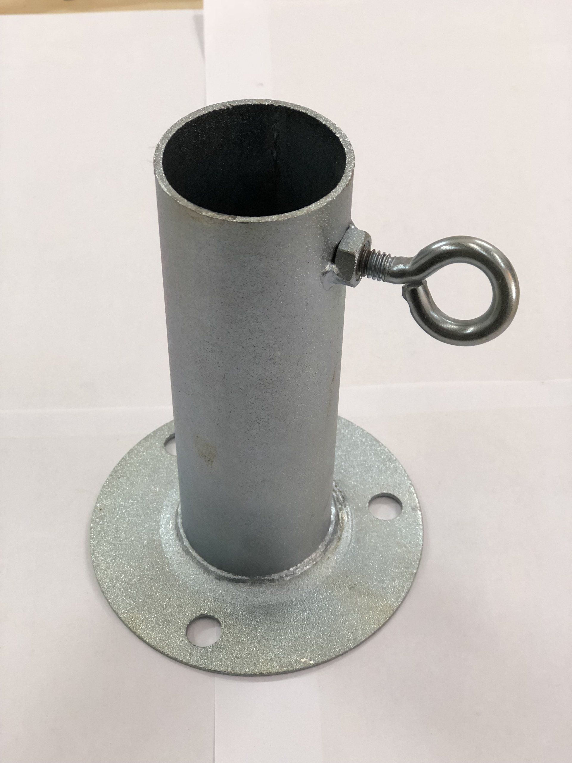 A metal pipe with a hook attached to it