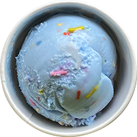 A bowl of blue ice cream with sprinkles on top.