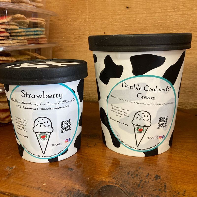 There are many different flavors of ice cream in the trays.