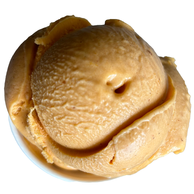 A close up of a scoop of ice cream in a bowl.