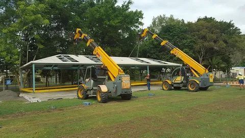 Two Crane Lift Lifting A Shed — Smithys Crane Hire in Trinity Beach, QLD