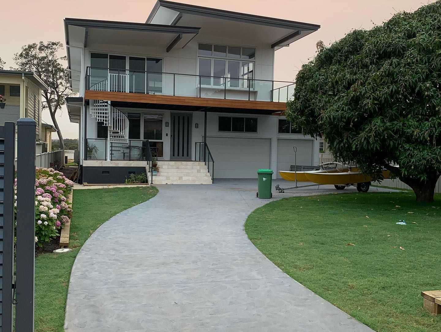 A group of construction workers are working on a swimming pool.