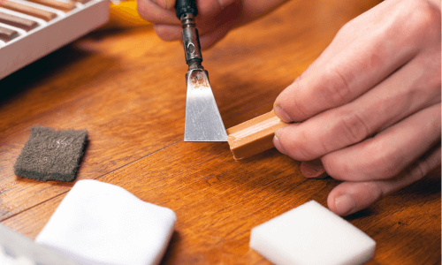 Wood floor being repaired