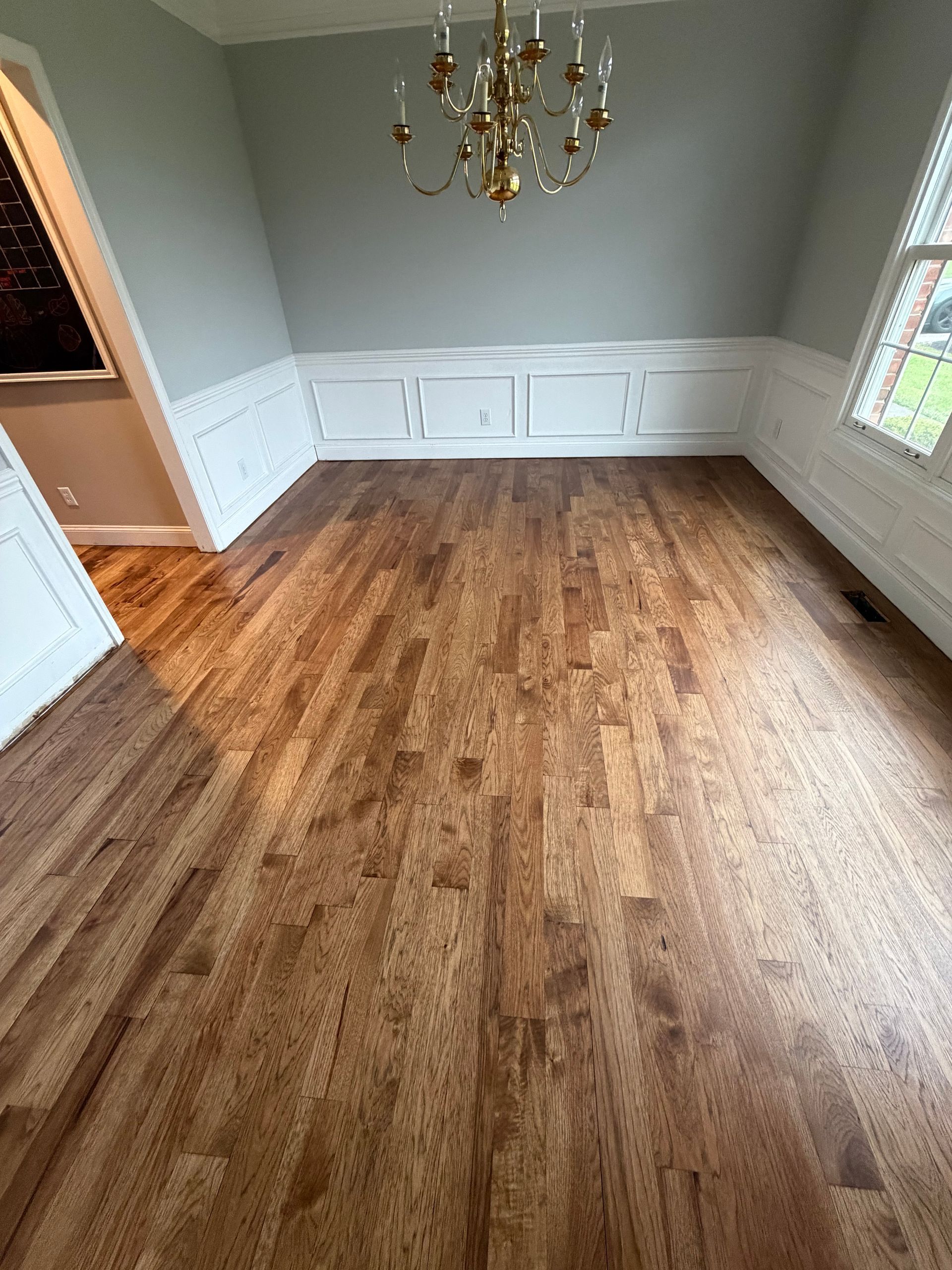 Refinished mahogany plank flooring 