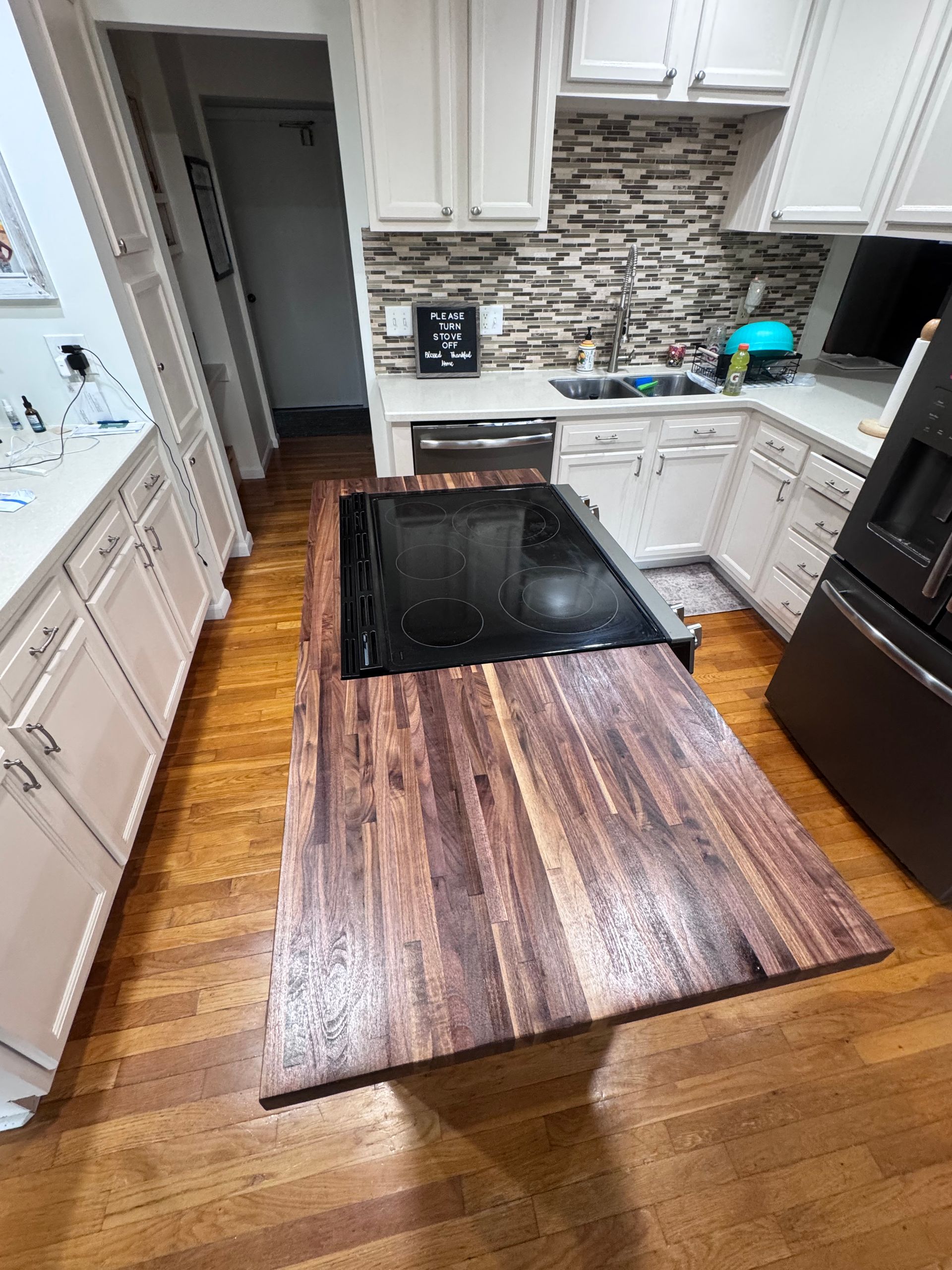 Refinished wood flooring in kitchen
