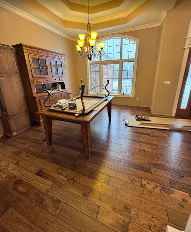 Refinished red oak parquet flooring in a vestibule