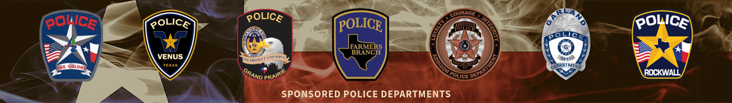 A group of police badges are lined up in front of a texas flag